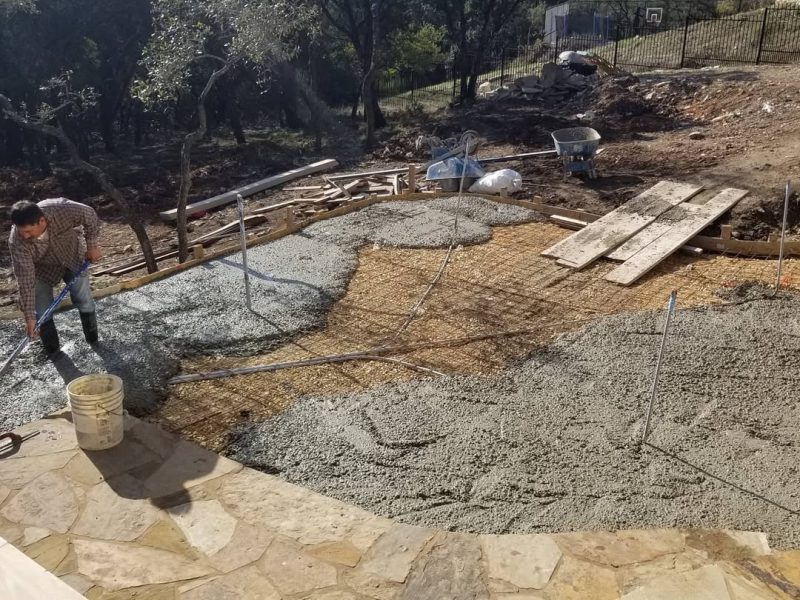 Concrete poured today. Next up is sitting wall and a flagstone overlay. Deck finally gets start