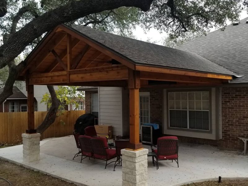 Went back out to get some final pics on this cover. Shingles, stain, stone columns, ceiling fan